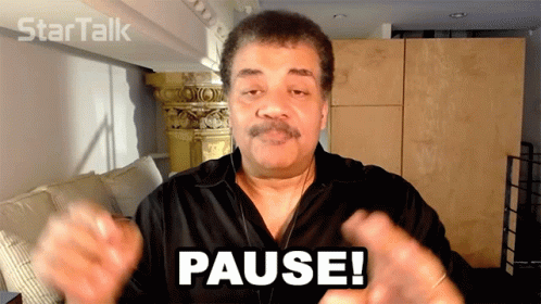 neil-de-grasse-tyson-hands-up-pause-30om76ofbwqsfdzb